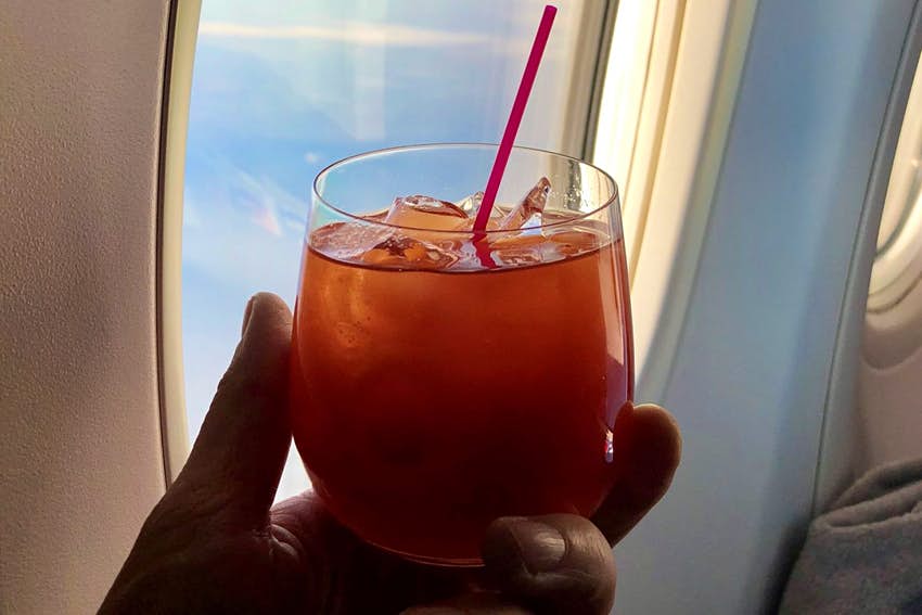 The Reason Why You Should Order A Bloody Mary On A Flight